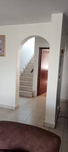 town house, with a two tier(two floors)